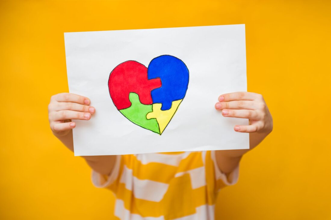 Autism jigsaw symbol in a heart shape